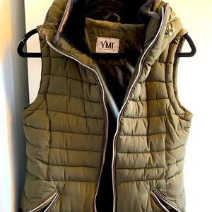 Puffy green vest with gold embellishments